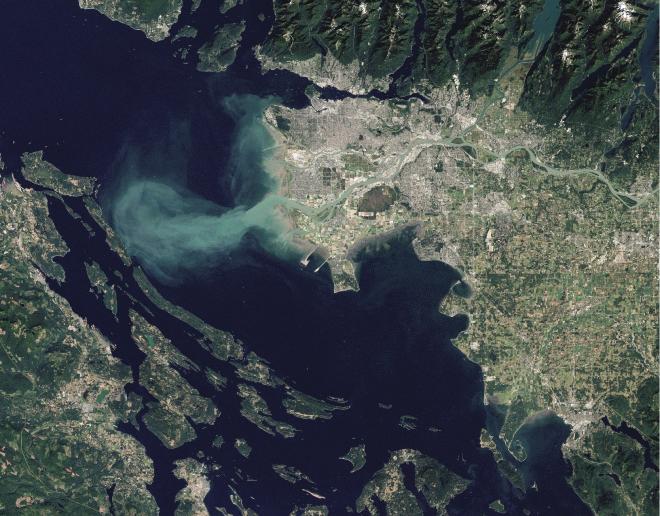 Sediment-laden water from the Fraser River enters the Straight of Georgia (page 34). Photo: NASA Earth Observatory