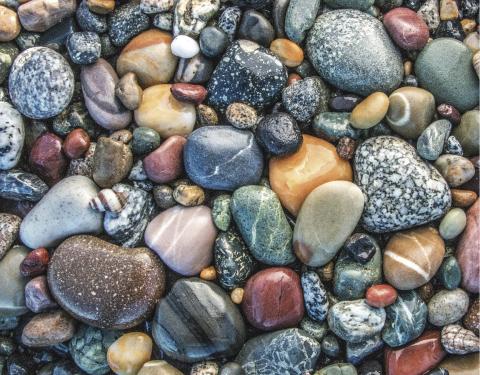 Surf-polished stones at Birch Bay State Park (page 12). Photo: Wendy Shattil/Bob Rozinski