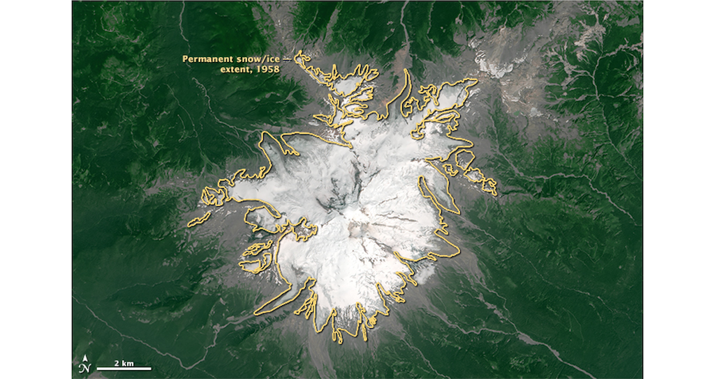 Aerial view of glaciers on Mount Baker in 2015 with yellow outline showing larger extent in 1958.