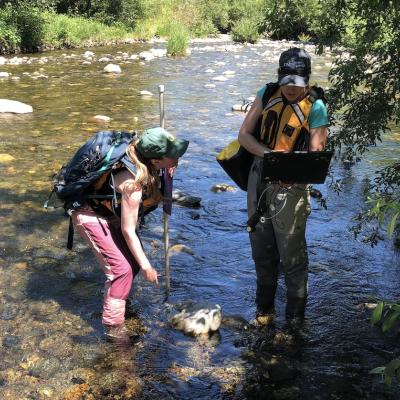 Amy Marsha and Aimee Fullerton standing in the Raging River