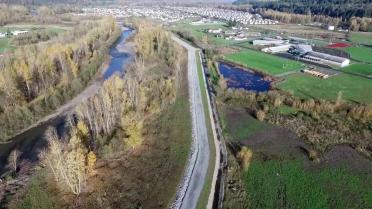 2016 aerial view of completed Calistoga Reach levee project in Orting, WA. Image courtesy: CSI Drone Solutions and Washington Rock Quarries, Inc. Video: https://www.youtube.com/watch?v=2H_NK6U2_zw